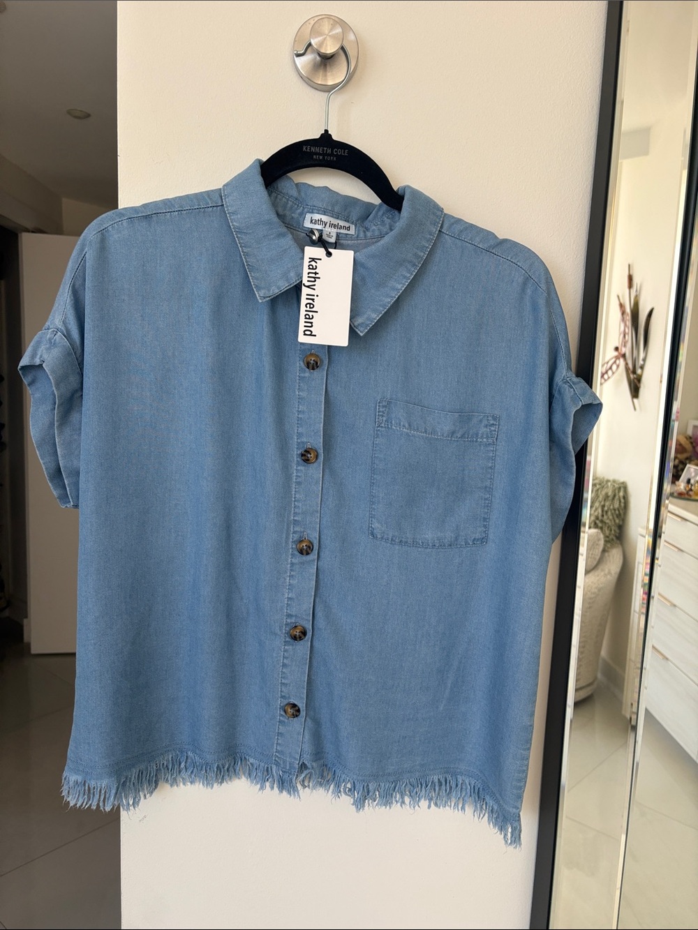 kathy ireland light blue denim button-down shirt with frayed hem detail